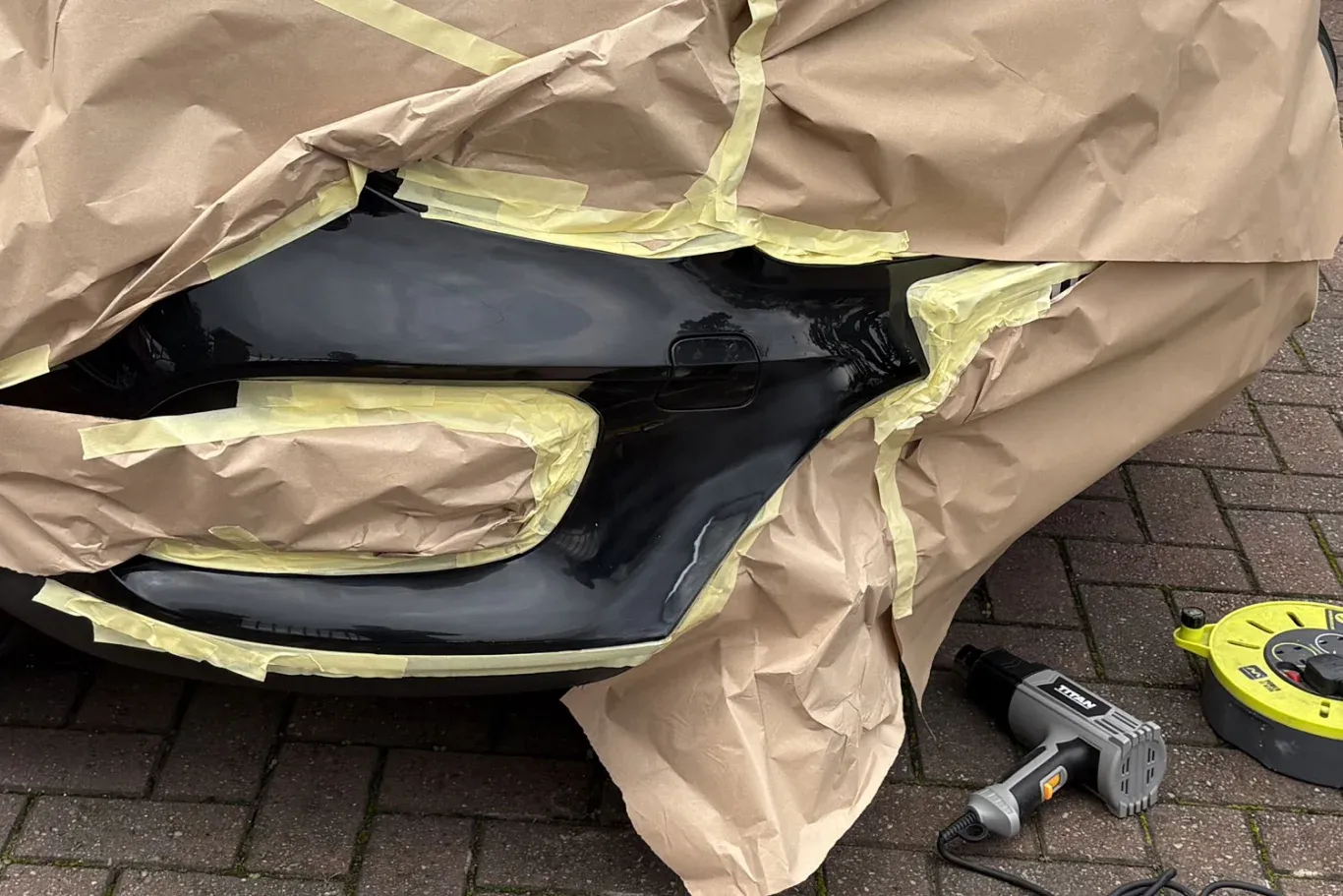 Bodywork Repair in Birmingham on client's driveway